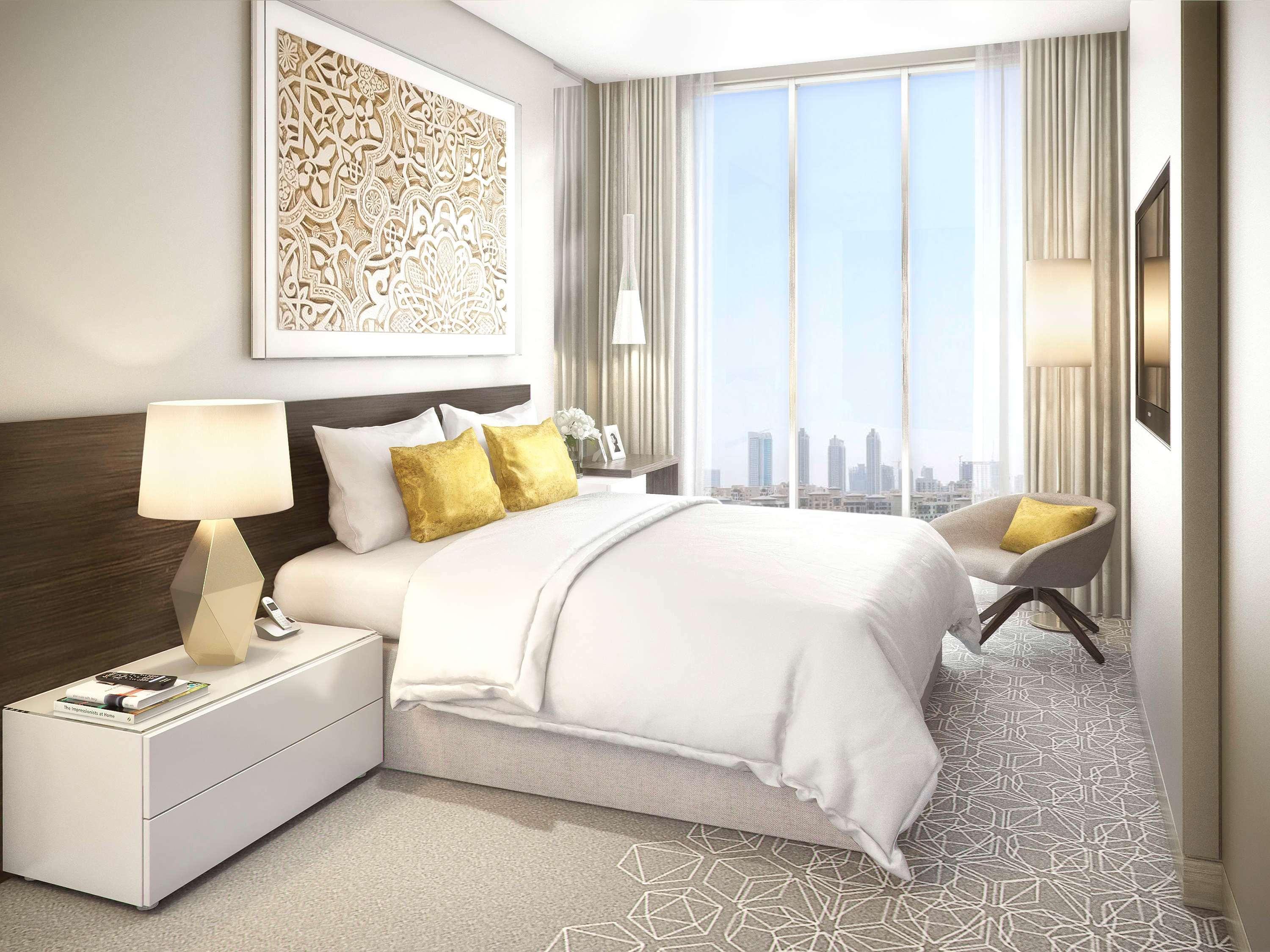 Grand Mercure Dubai City Exterior foto A bedroom at the hotel